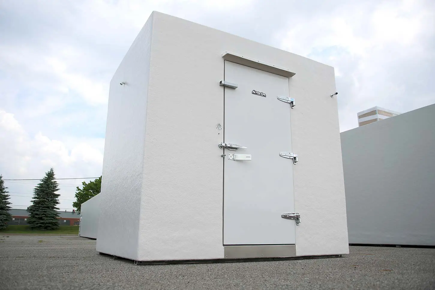 White outdoor walk-in cooler