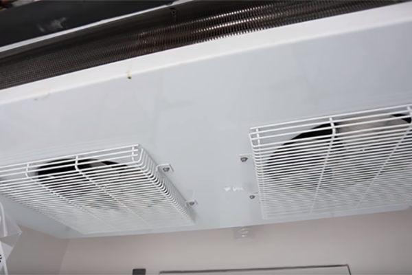 White fans in walk-in refrigeration unit