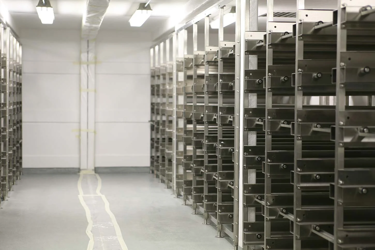 Metal shelving inside cold storage unit